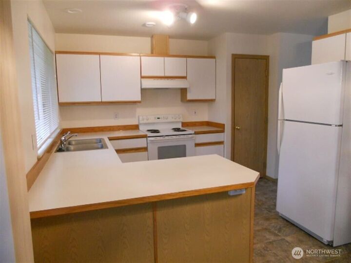 Property Photo: 5711 10th Avenue W WA 98203