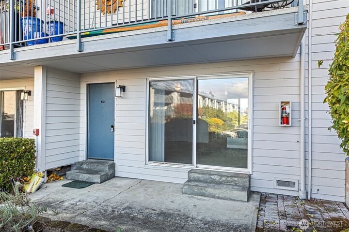 Property Photo:  22977  Marine View Dr S C104  WA 98198 