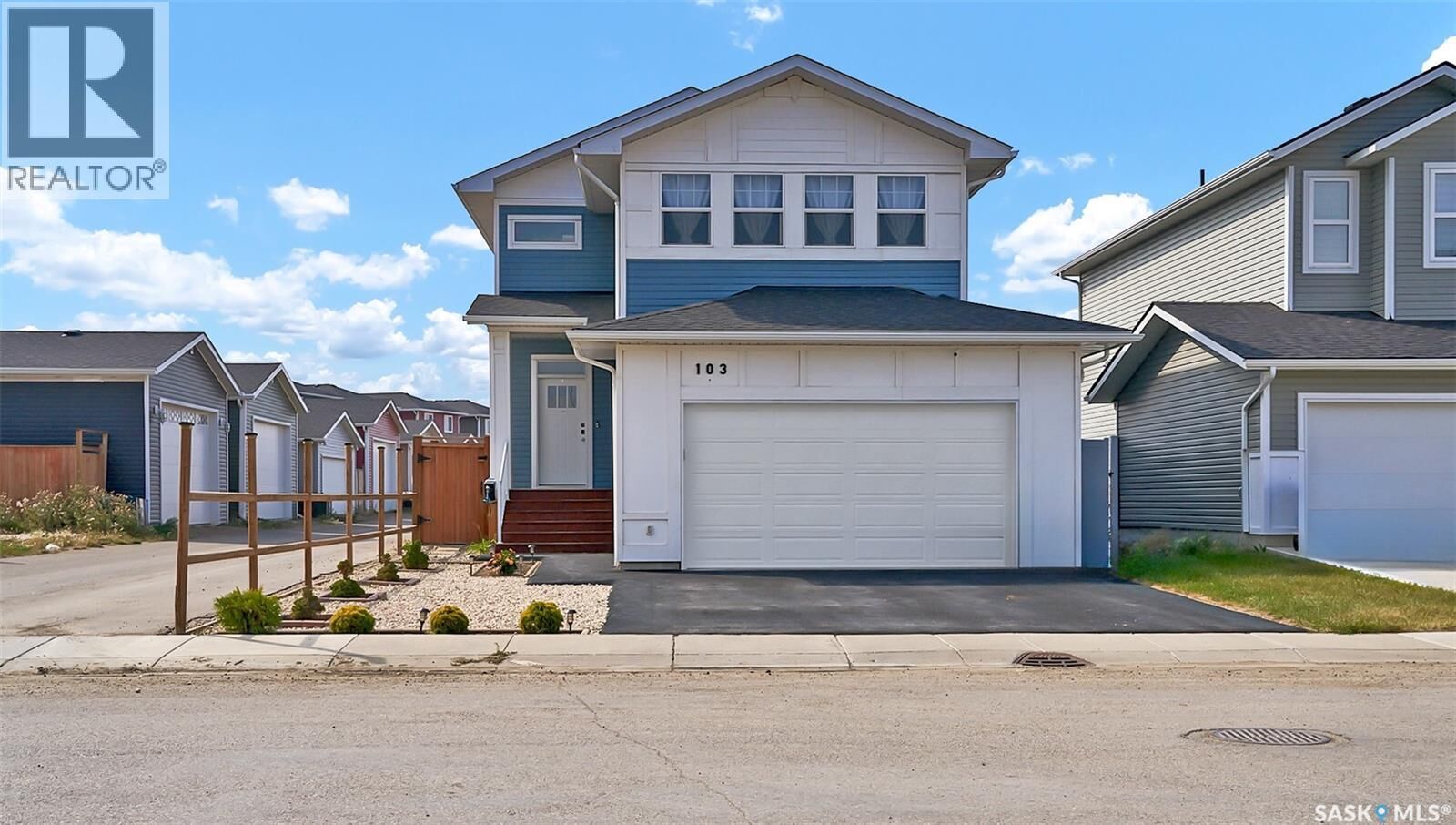 Property Photo:  103 Stromberg Crescent  SK S7L 7C4 