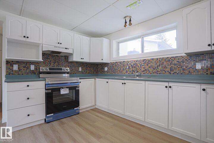 Property Photo:  1831 51 Street NW  AB T6L 1X4 