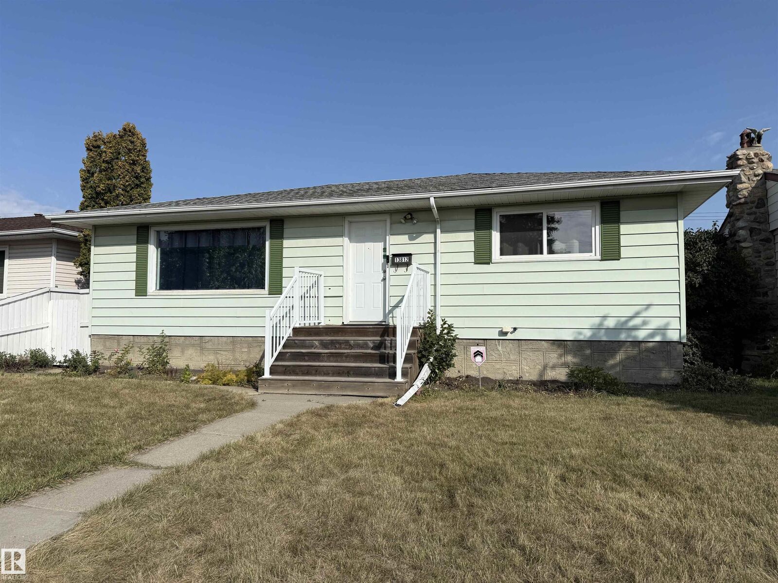 Property Photo:  13812 132 Avenue NW  AB T5L 3R8 