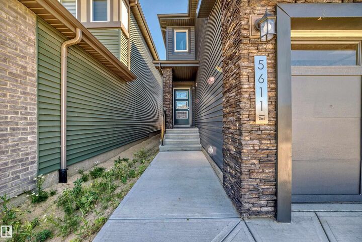 Property Photo:  5611 Kootook Place SW  AB T6W 4Z5 