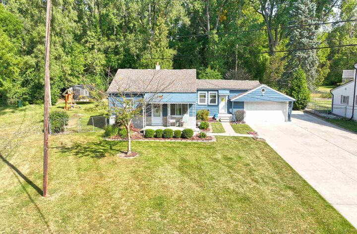Property Photo:  6651 Mayfair Road  MI 48317 