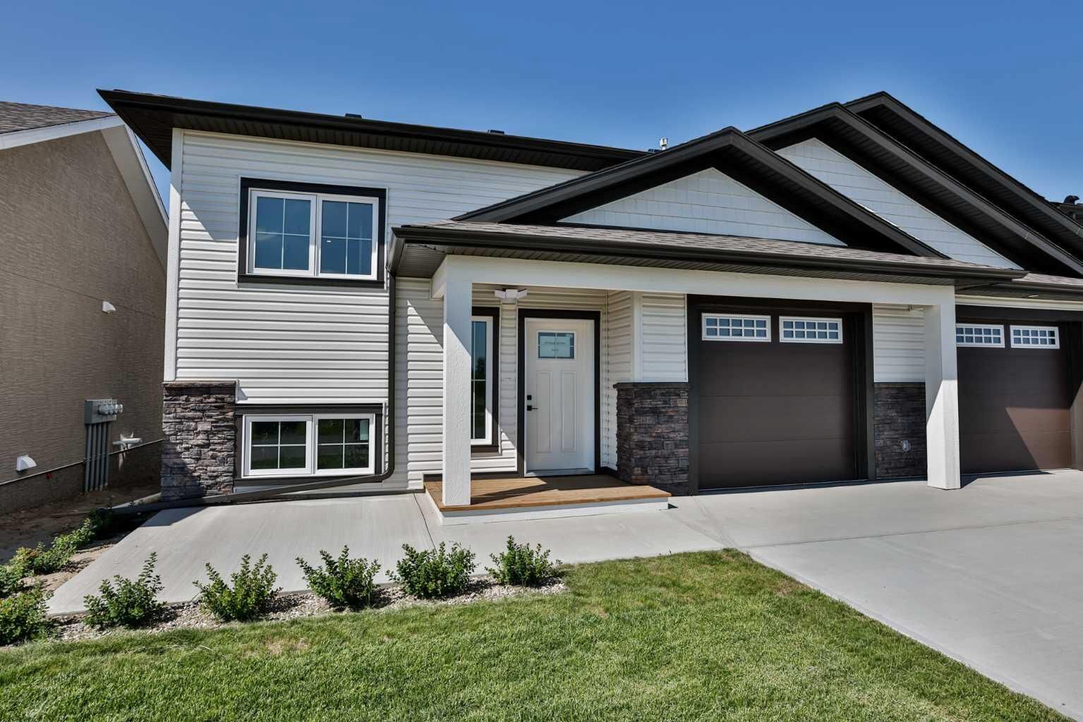 Property Photo: 423 Meadowlark Way AB T0L 2B0