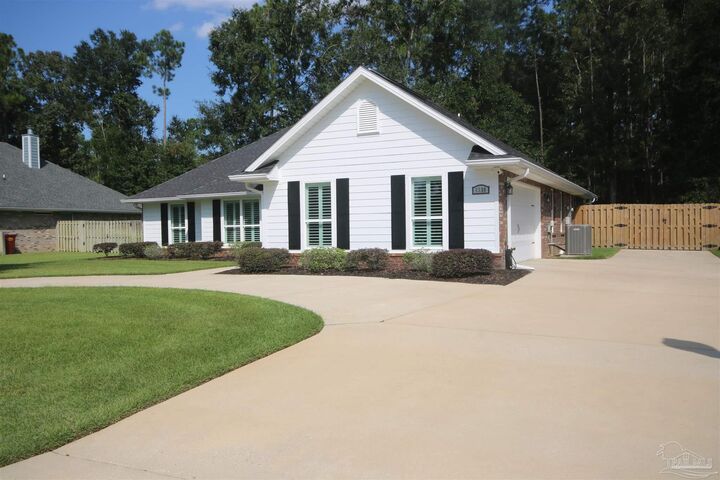 Property Photo:  6130 Dollarweed Dr  FL 32571 