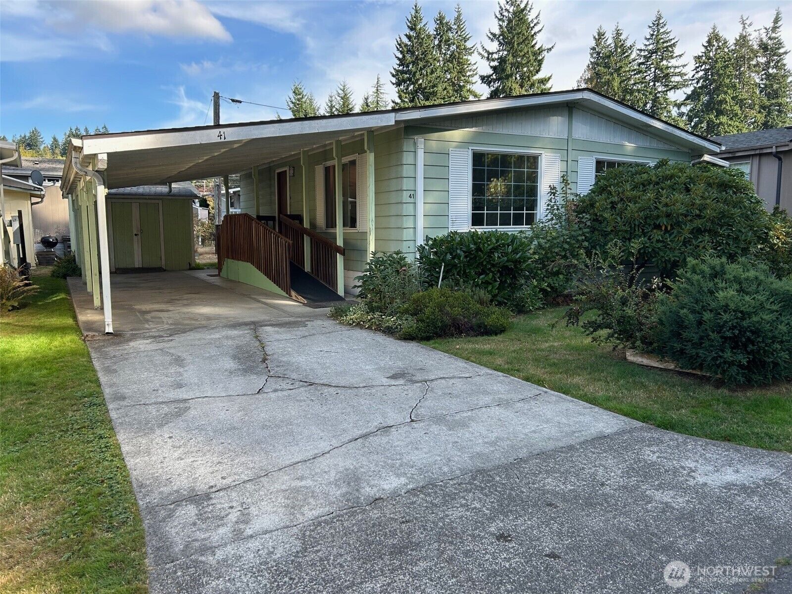 Property Photo:  600 NE Lincoln Road 41  WA 98370 