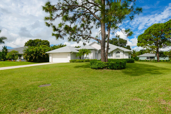 Property Photo:  311 SE Fisk Road  FL 34984 