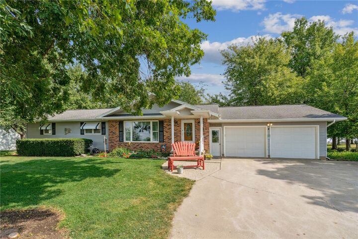 Property Photo:  5758 20th Ave Dr  IA 52349 