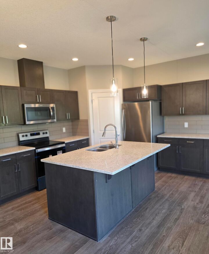 Property Photo:  4331 126 Avenue NW  AB T5A 1V5 