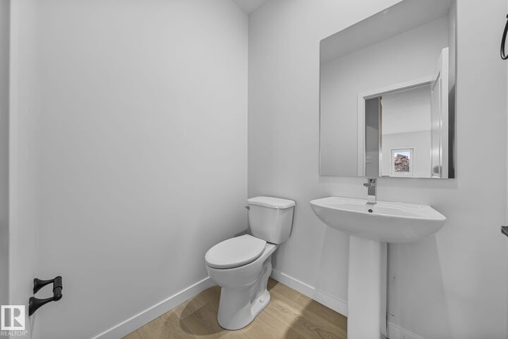 Property Photo:  6385 King Wynd SW  AB T6W 5J3 