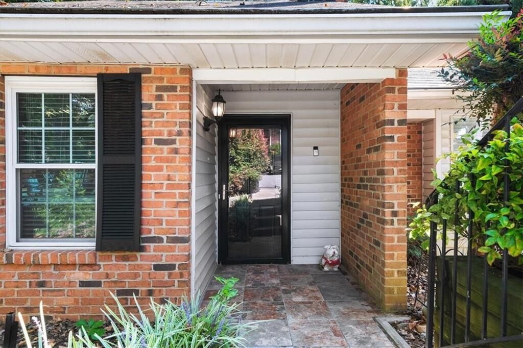 Property Photo:  1195 Minhinette Drive J  GA 30075 
