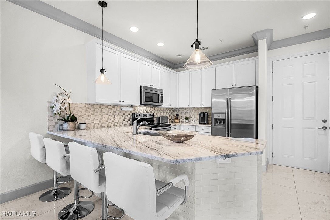 Property Photo:  9108 Capistrano Street S 7405  FL 34113 