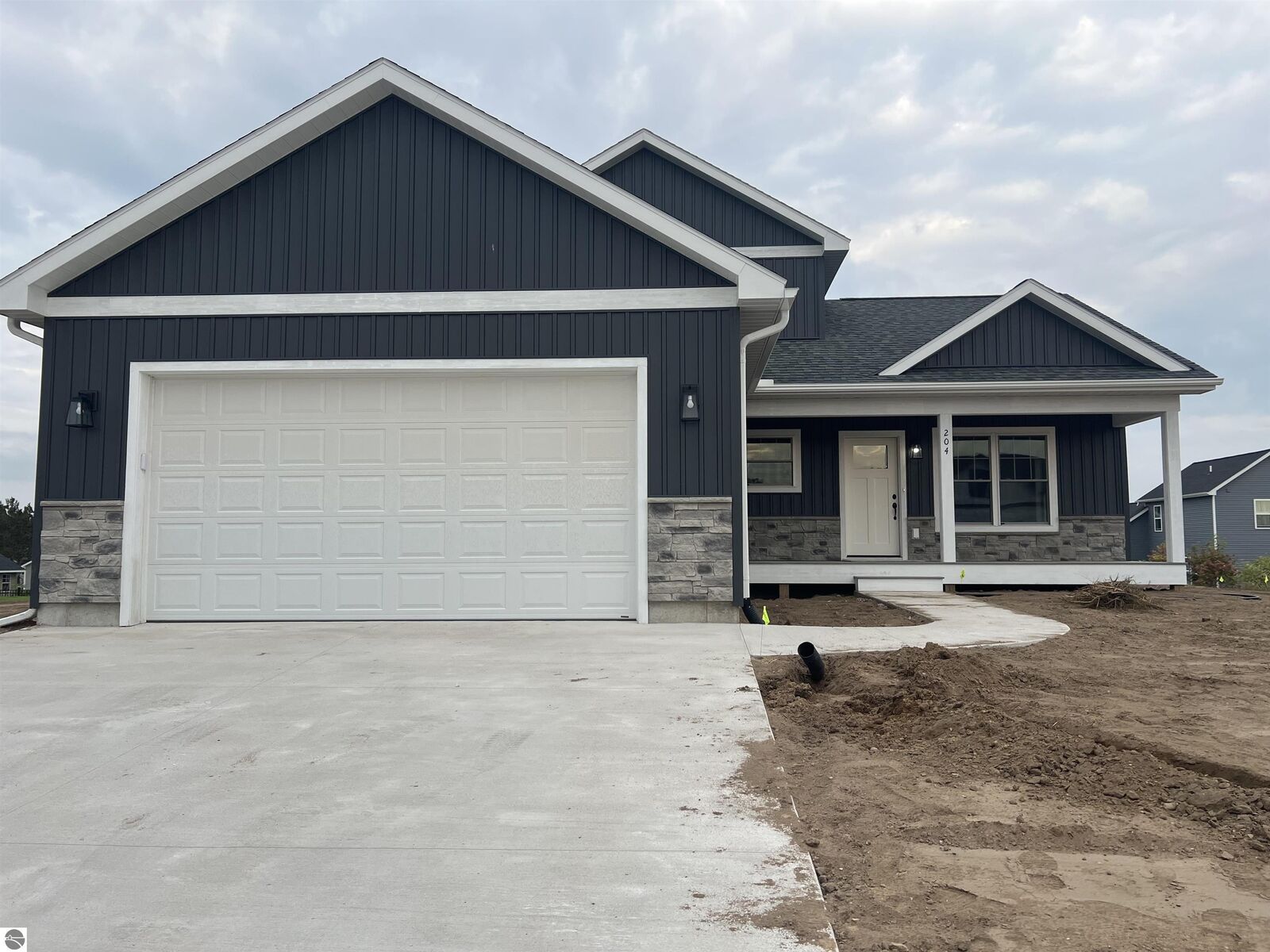 Property Photo:  204 Grouse Run  MI 49685 