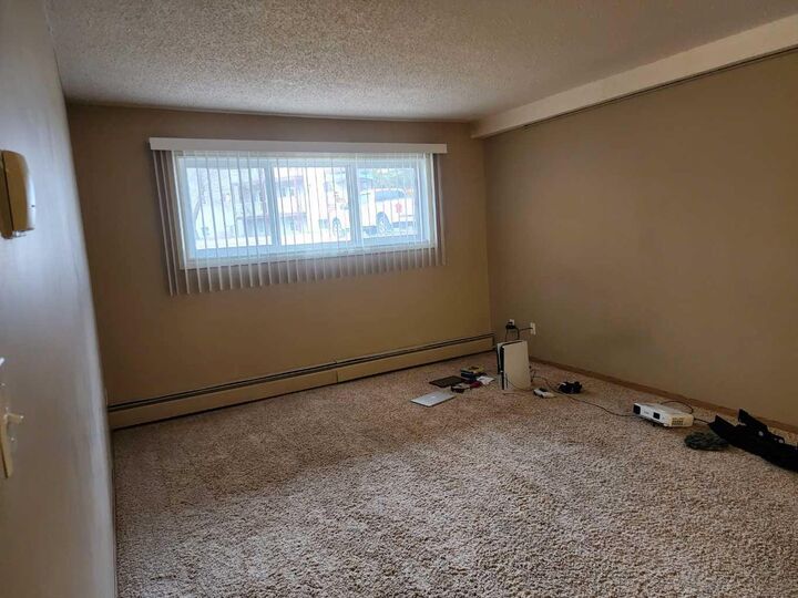 Property Photo:  5812 61 Street 103  AB T4N 6H4 