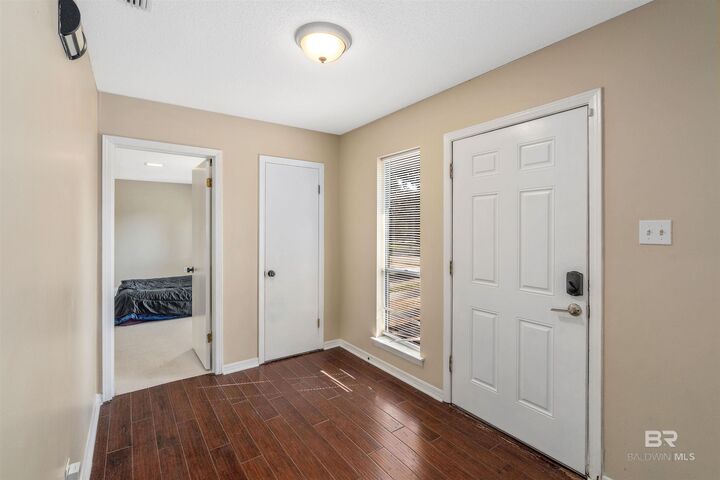 Property Photo: 2004 E Pine Needle Drive AL 36609