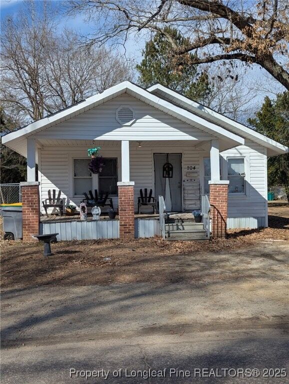 Property Photo:  204 Warwick Mill Road  NC 28358 