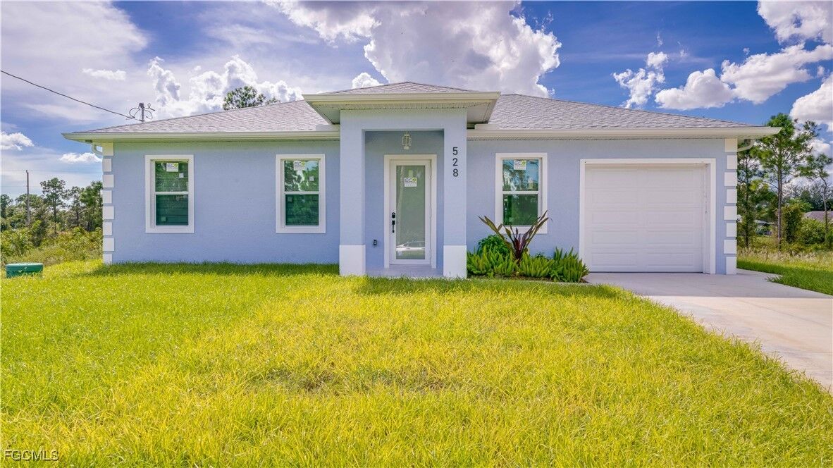 Property Photo:  528 Aspen Avenue S  FL 33974 