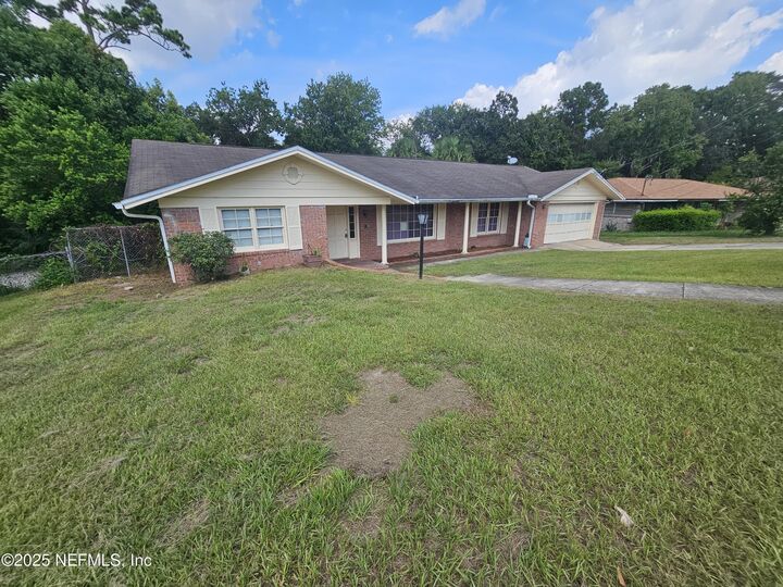 Property Photo: 1934 Woodleigh Drive W FL 32211