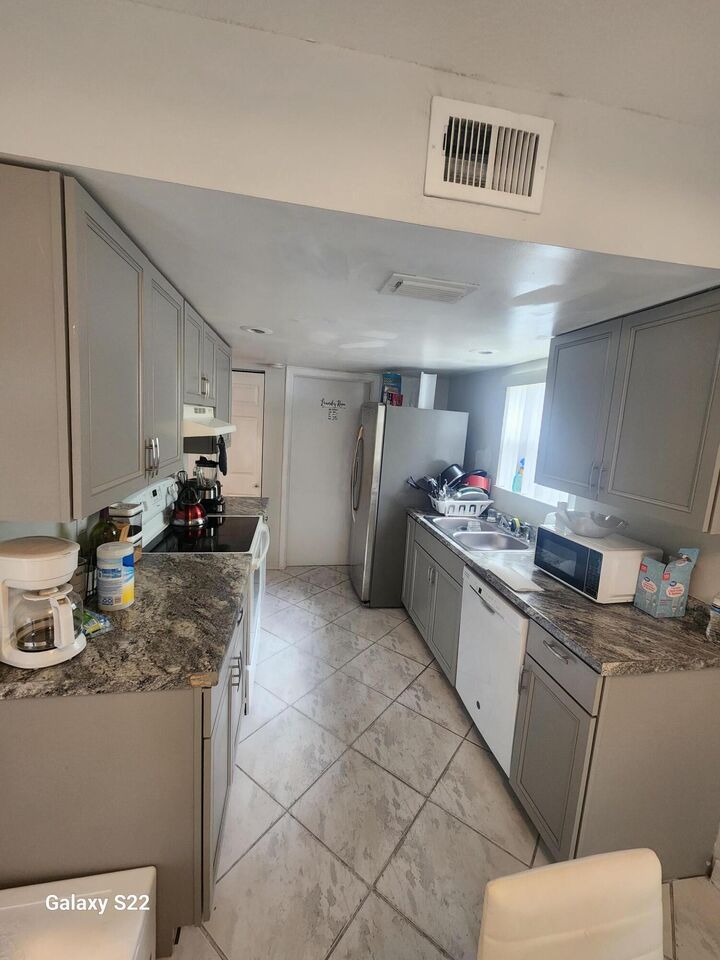 Property Photo:  5884 Dewberry Way  FL 33415 