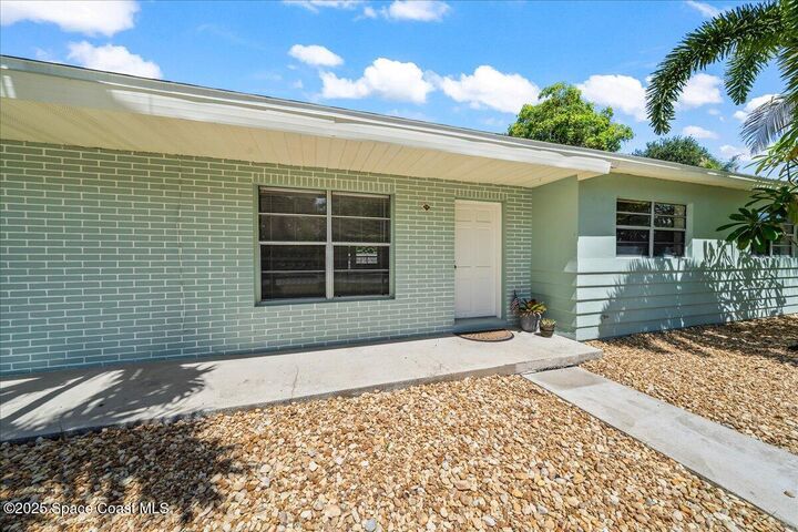 Property Photo:  313 Polaris Drive  FL 32937 