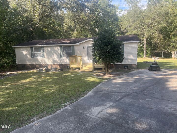 Property Photo:  6844 Bristle Bark Court  NC 27591