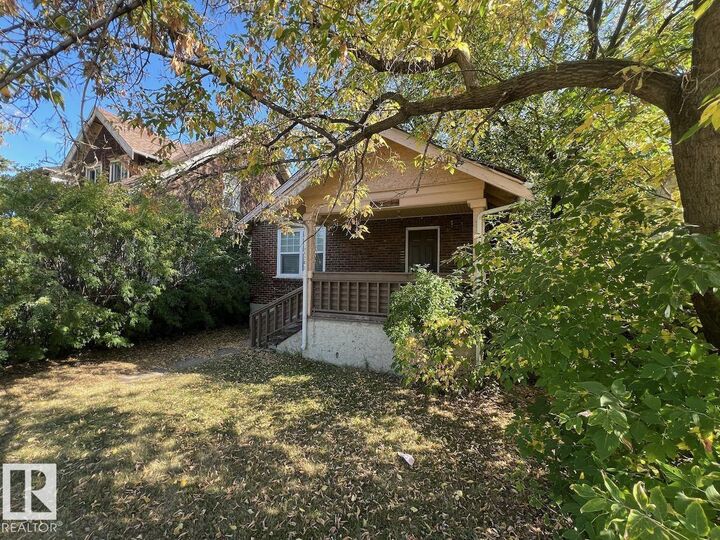 Property Photo:  11243 86 Street NW  AB T5B 3H7 