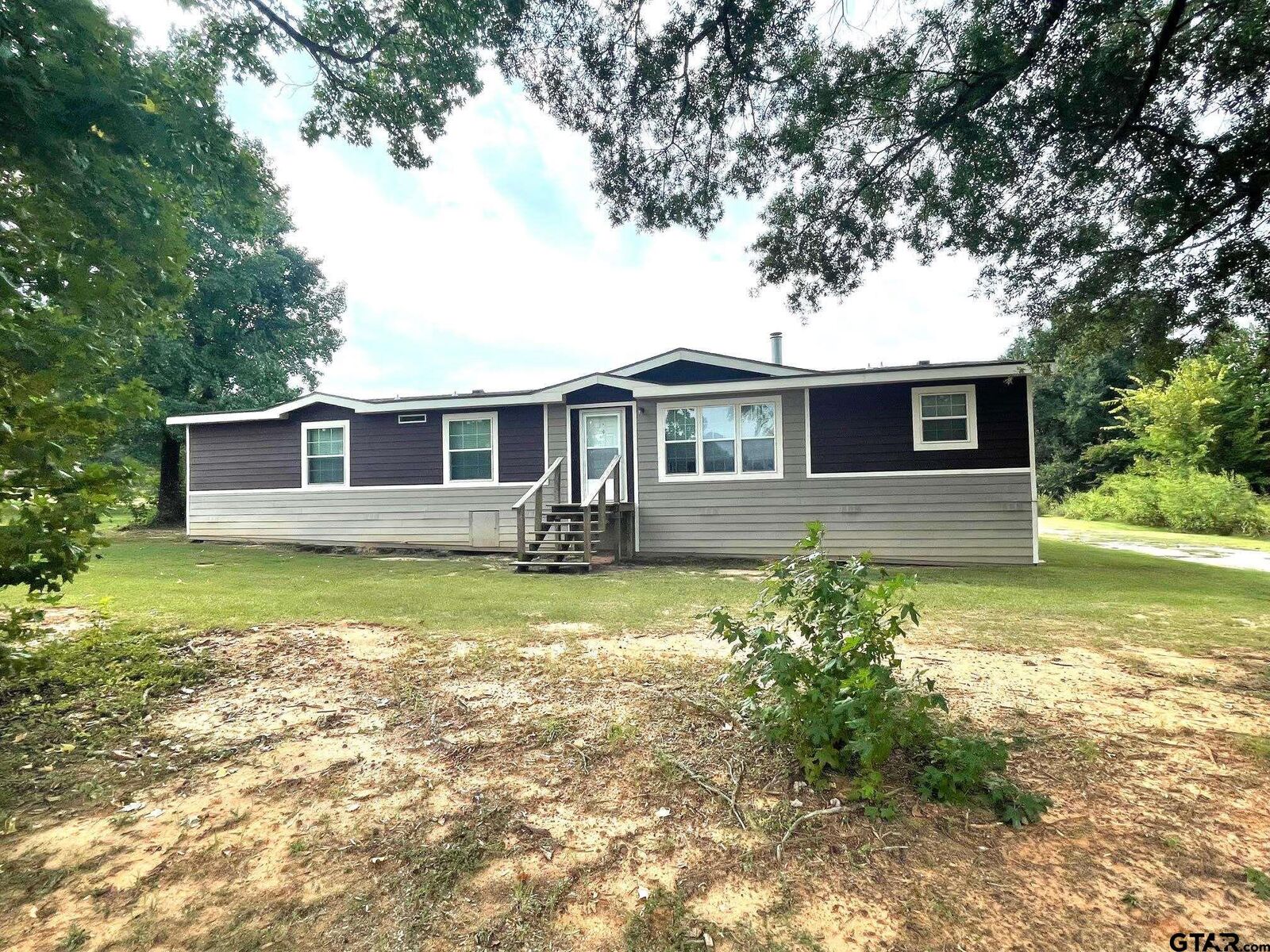 Property Photo:  421 County Road 1563  TX 75410 