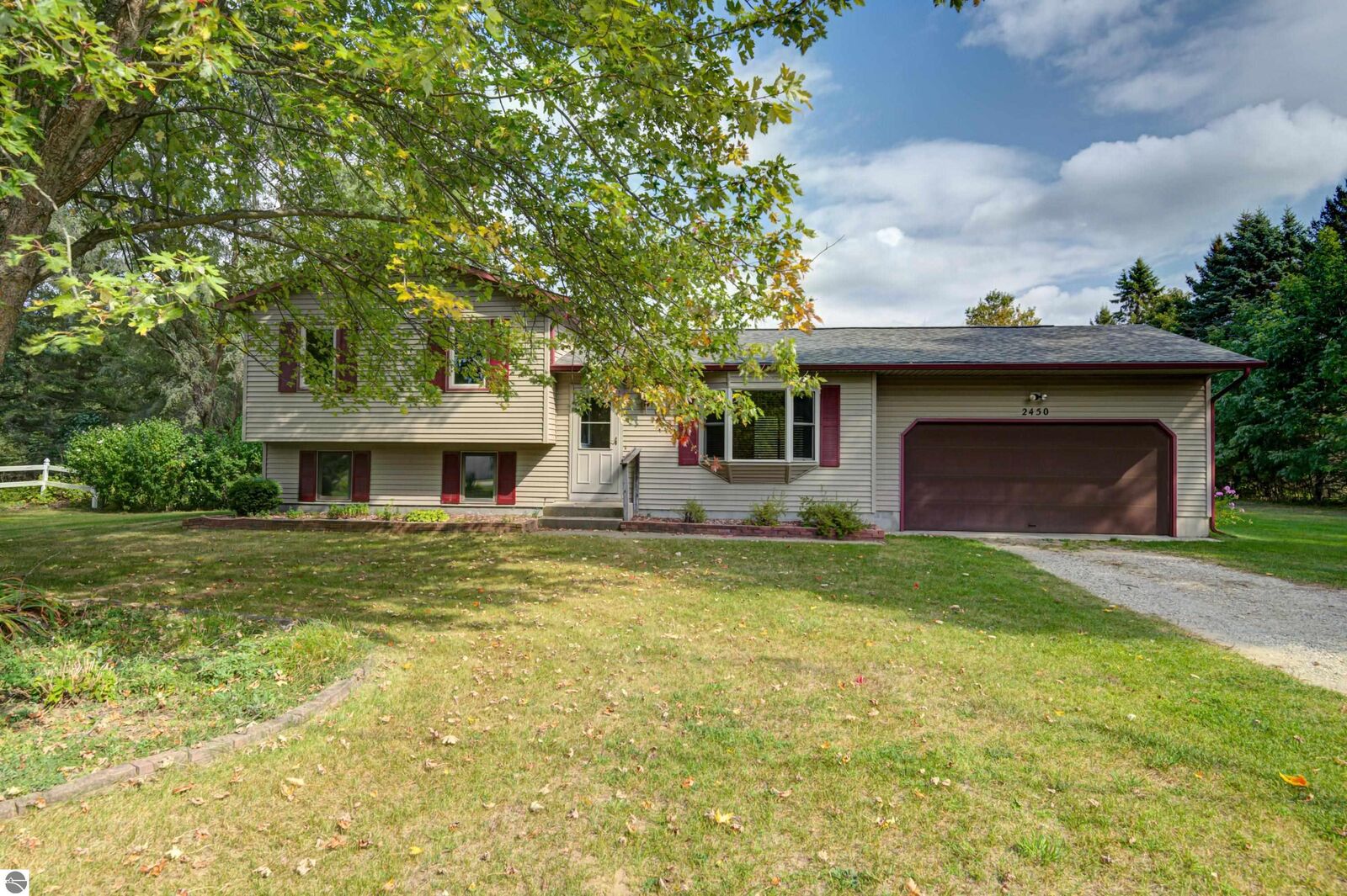 Property Photo:  2450 W Long Lake Road  MI 49685 