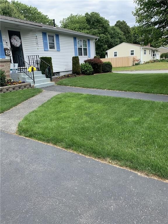 Property Photo:  91 Carnation Drive  RI 02886 