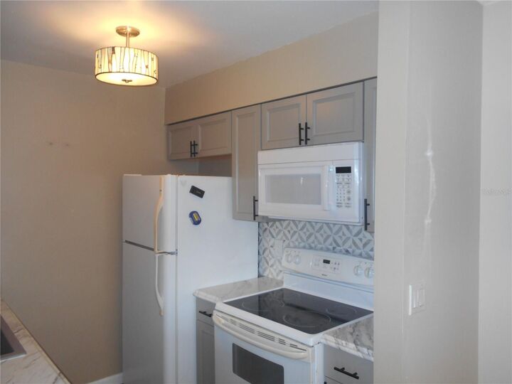 Property Photo: 5771 Peregrine Avenue A01 FL 32819