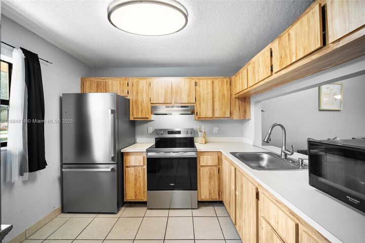 Property Photo: 9258 NW 1st St 206 FL 33024