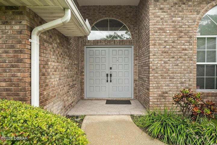 Property Photo:  127 Muirfield Drive  FL 32114 