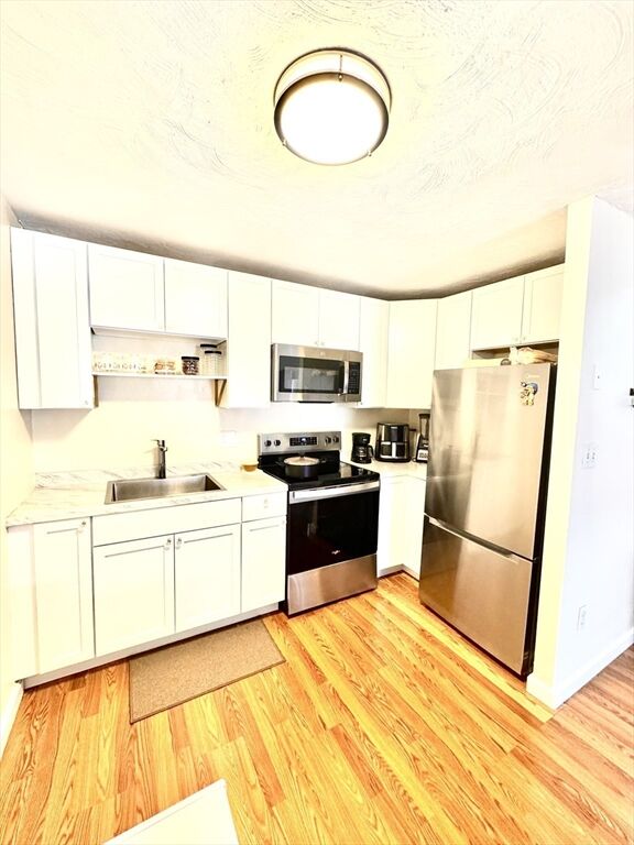 Property Photo:  27 Gordon St 206  MA 01702 