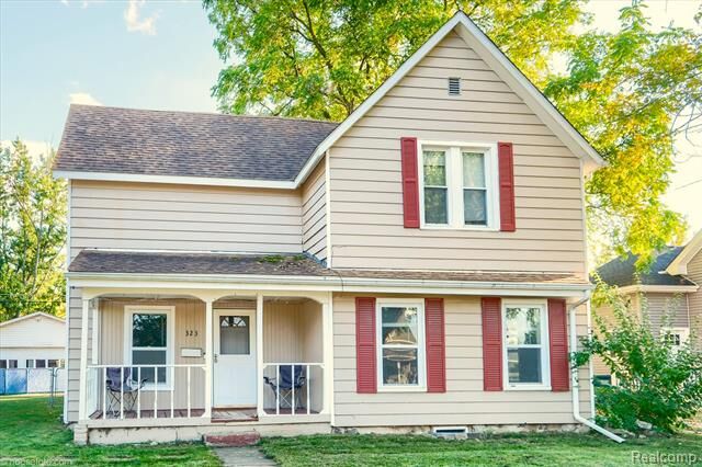 Property Photo: 323 Turrill Avenue MI 48446