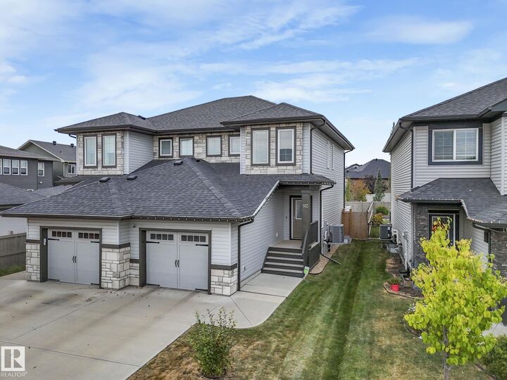 Property Photo:  103 Amberley Way  AB T8H 0P5 