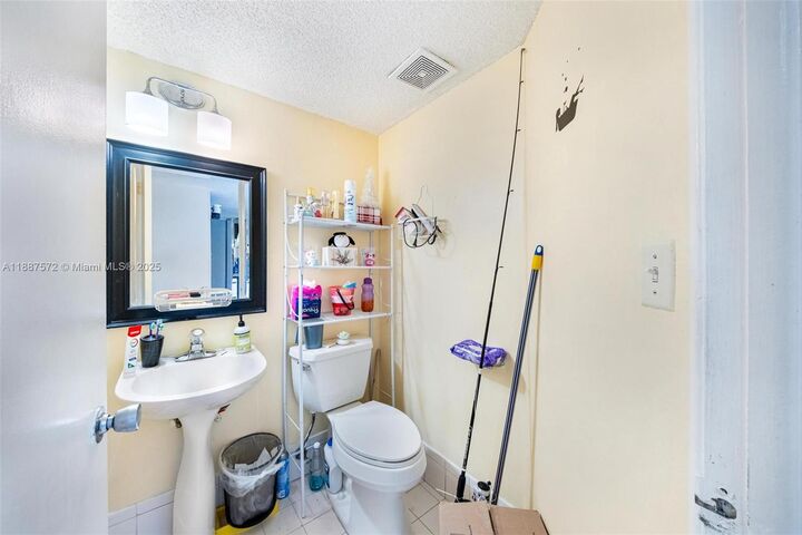 Property Photo: 1178 NW 123rd Pl 1210 FL 33182