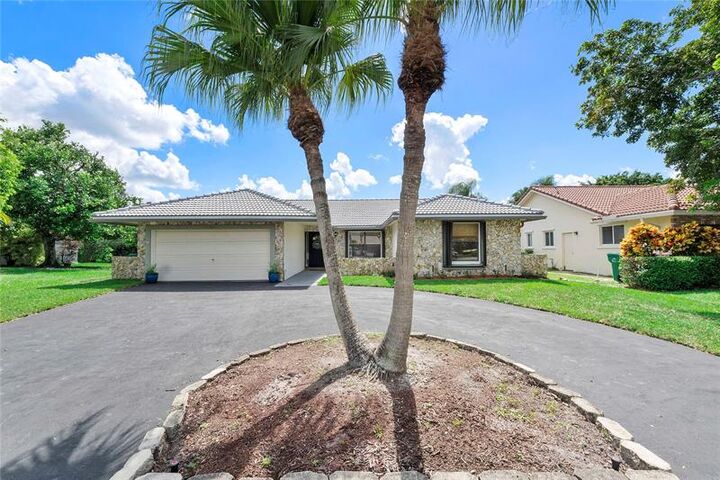 Property Photo:  11362 NW 3rd Pl  FL 33071 