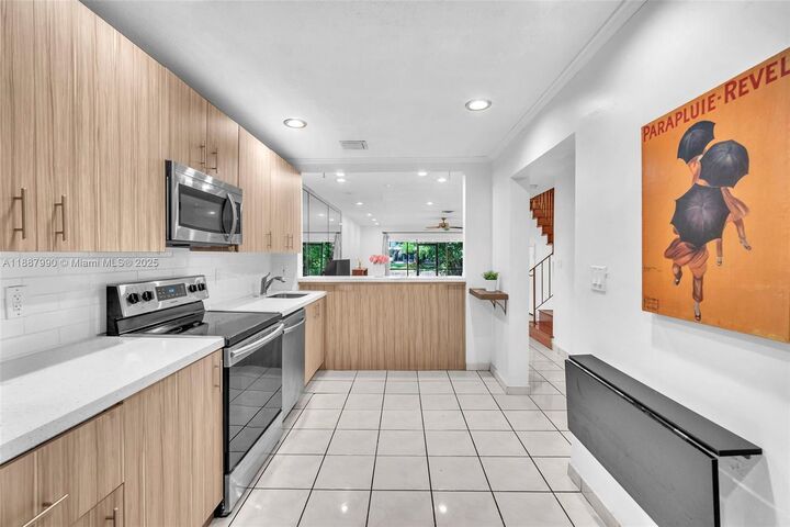 Property Photo:  3825 Estepona Ave 11D5  FL 33178 
