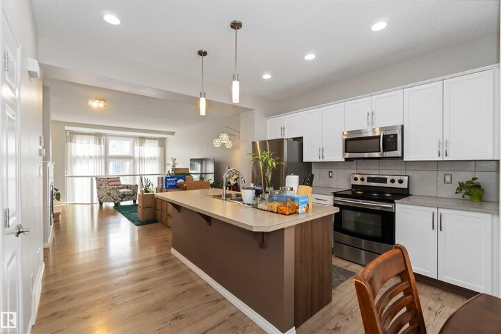 Property Photo:  9932 221 Street NW  AB T5T 4M7 