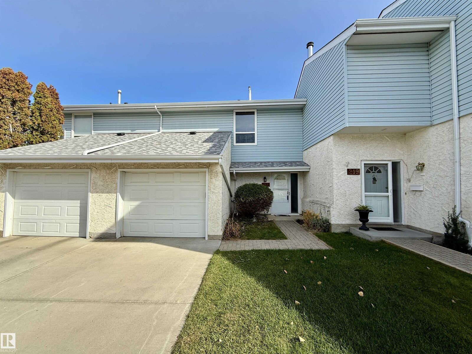 Property Photo: 221 Callingwood Place NW AB T5T 2C6