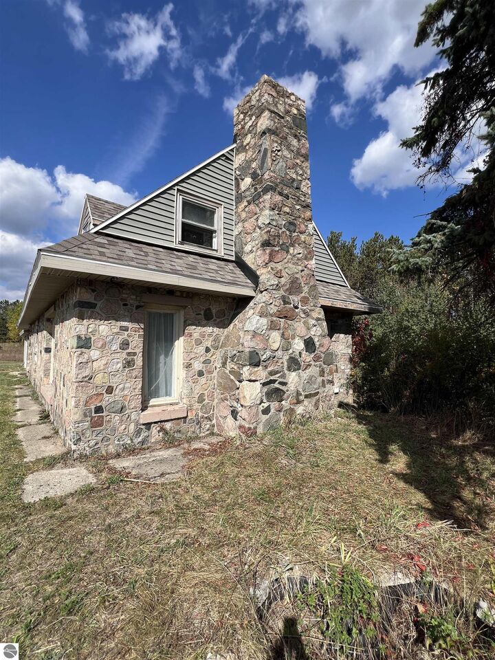 Property Photo:  9861 E M-115  MI 49601