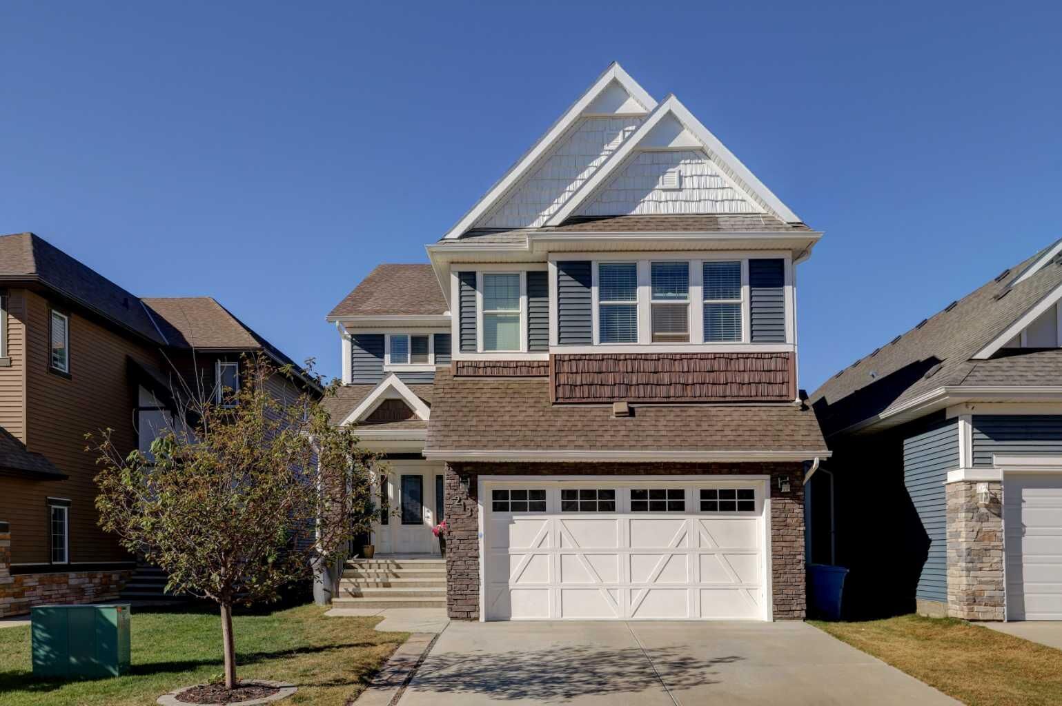 Property Photo:  213 Kingsmere Cove SE  AB T4A 0S1 