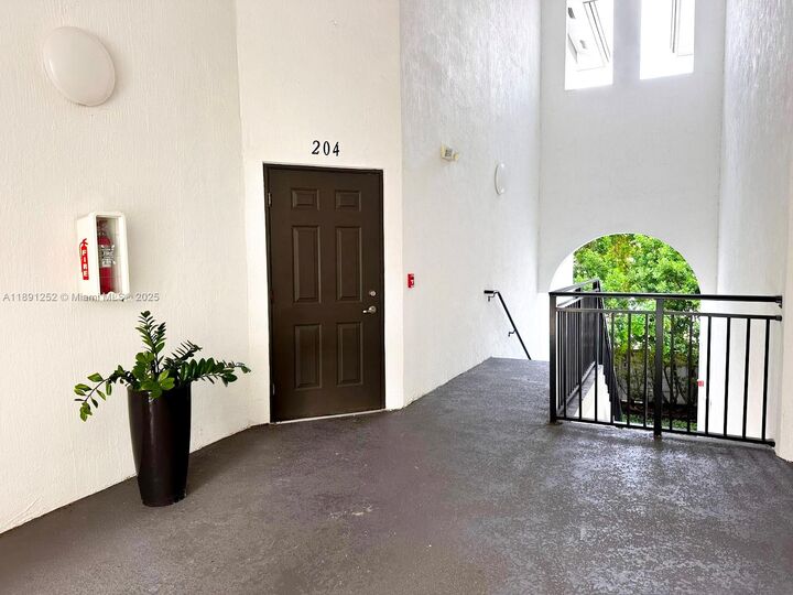 Property Photo: 15540 SW 136 St 204 FL 33196