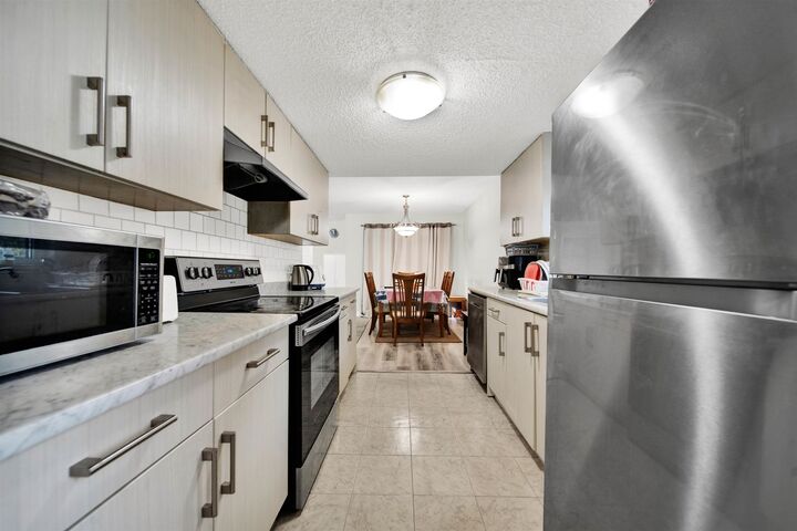 Property Photo: 13275 70B Avenue 104 BC V3W 7Z2