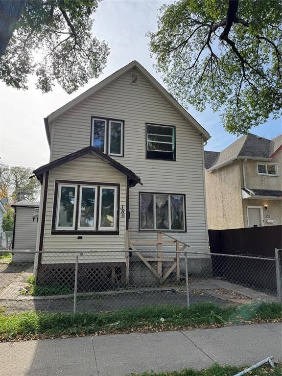 Property Photo: 386 College Avenue MB R2W 1M3