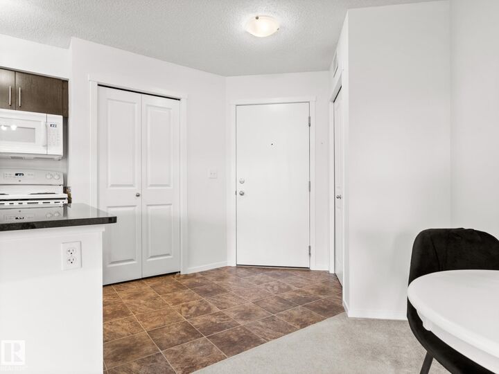 Property Photo: 3207 James Mowatt Trail SW 111 AB T6W 3L6