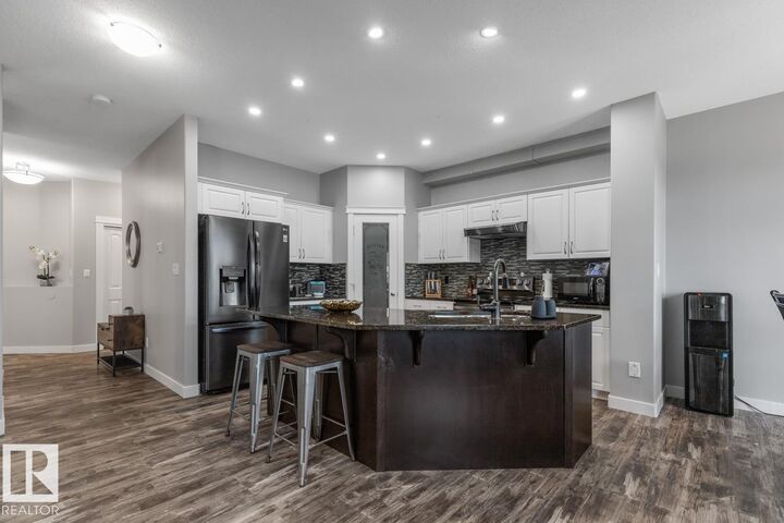 Property Photo: 612 Suncrest Way AB T8H 0G7