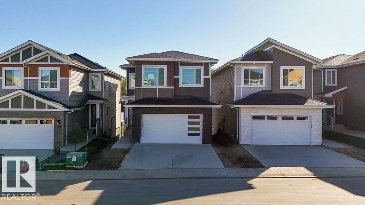 Property Photo: 3309 Chickadee Drive NW AB T5S 0V5