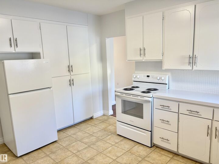 Property Photo: 12050 56 Street NW AB T5W 3T1