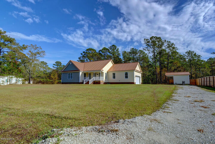 Property Photo:  551 Holly Ridge Road  NC 28445 